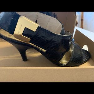 Beautiful, understated Michael Kors Sandal, short heel.